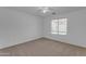 Bright bedroom with neutral carpeting and a window at 40440 N High Meadows Dr, San Tan Valley, AZ 85140