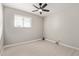 Charming bedroom with ceiling fan, light walls and wood-look flooring at 4263 W Morten Ave, Phoenix, AZ 85051