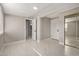 Bright bedroom with light walls, wood-look floors, and mirrored closet doors at 4263 W Morten Ave, Phoenix, AZ 85051