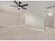 Living room with tile flooring and ceiling fan at 4263 W Morten Ave, Phoenix, AZ 85051