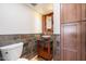 Chic half bathroom with vessel sink and slate tile at 4316 N Parkway Ave, Scottsdale, AZ 85251