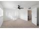 Bright bedroom with ceiling fan and access to hallway at 4316 N Parkway Ave, Scottsdale, AZ 85251