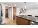 Kitchen with granite countertop and wood cabinets at 4316 N Parkway Ave, Scottsdale, AZ 85251