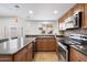 Modern kitchen with stainless steel appliances and granite counters at 4316 N Parkway Ave, Scottsdale, AZ 85251