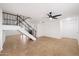 Open living room with tile floors and staircase at 4316 N Parkway Ave, Scottsdale, AZ 85251