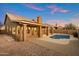 Spacious backyard with a refreshing pool and a lovely patio area at 4330 N Ranier Cir, Mesa, AZ 85215