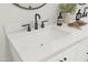 Bathroom sink with quartz countertop and matte black faucet at 4388 N 203Rd Dr, Buckeye, AZ 85396