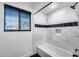 Bathroom with shower/tub combo and marble tile at 4501 E Calle Redonda --, Phoenix, AZ 85018