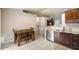 Cozy dining area near the kitchen with wooden table set and natural light at 480 E Bart Dr, Chandler, AZ 85225