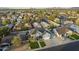 Daytime aerial view of a two story gray home surrounded by city at 5344 E Catalina Ave, Mesa, AZ 85206