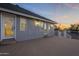 Back deck with white railings offers a charming view with exterior lighting at 5344 E Catalina Ave, Mesa, AZ 85206