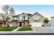 Beautiful two-story home featuring manicured lawn and covered porch at 5344 E Catalina Ave, Mesa, AZ 85206