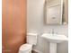 Small powder room with pedestal sink and toilet at 5612 W Alyssa Ln, Phoenix, AZ 85083