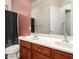 Bathroom with double vanity and a shower/tub combo at 5612 W Alyssa Ln, Phoenix, AZ 85083