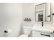 Modern half bathroom featuring elegant fixtures, a sleek vanity, and stylish accents at 6809 E Gelding Dr, Scottsdale, AZ 85254