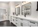 Elegant bathroom features a double sink vanity, quartz countertops and modern fixtures at 6809 E Gelding Dr, Scottsdale, AZ 85254