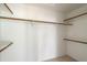 Walk-in closet with built in shelves and rods ready for storage at 9705 E Mountain View Rd # 1050, Scottsdale, AZ 85258