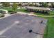 Outdoor basketball court with a covered picnic area, set in a well-maintained recreational space at 9725 E Navajo Pl, Sun Lakes, AZ 85248