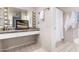 Bathroom featuring vanity lighting, tiled floor, and shower with curtain at 9725 E Navajo Pl, Sun Lakes, AZ 85248