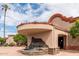 Building entrance featuring a fountain and well maintained landscaping at 9725 E Navajo Pl, Sun Lakes, AZ 85248