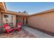 Inviting front porch with brick pavers and comfortable outdoor seating at 9725 E Navajo Pl, Sun Lakes, AZ 85248