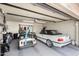 Garage featuring two cars and ample overhead storage at 9725 E Navajo Pl, Sun Lakes, AZ 85248