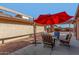 Outdoor patio featuring shade and comfortable seating, perfect for relaxing and entertaining at 9725 E Navajo Pl, Sun Lakes, AZ 85248