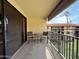 Private balcony with table and chairs, offering a view of the complex at 10330 W Thunderbird Blvd # A304, Sun City, AZ 85351