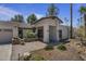 Beautiful single-story home with a meticulously landscaped front yard at 10685 E Cinnabar Ave, Scottsdale, AZ 85258