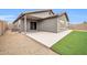 Spacious backyard with artificial turf and covered patio at 11004 N 154Th Ln, Surprise, AZ 85379