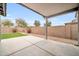 Covered patio and small grassy backyard at 11004 N 154Th Ln, Surprise, AZ 85379