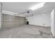 Garage with automatic door opener and extra storage at 11004 N 154Th Ln, Surprise, AZ 85379