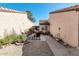 Charming patio featuring an outdoor seating area, neutral rug, and stucco walls for privacy at 11129 N 109Th St, Scottsdale, AZ 85259