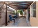 A beautiful covered patio with dining table set to enjoy outdoor eating at 11129 N 109Th St, Scottsdale, AZ 85259