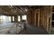 Unfinished interior with exposed framing and wiring at 11438 E Utopia Ave, Mesa, AZ 85212