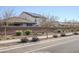 Residential area with a two-story house and solar panels at 13184 N 144Th Ln, Surprise, AZ 85379