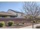 Residential area with a two-story house and solar panels at 13184 N 144Th Ln, Surprise, AZ 85379