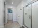 Bathroom with shower, and access to hallway at 13184 N 144Th Ln, Surprise, AZ 85379