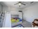 bedroom featuring a bunk bed with a slide and closet at 13184 N 144Th Ln, Surprise, AZ 85379