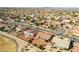 Aerial view showing a home's location within a community near a golf course at 13917 W Pavillion Dr, Sun City West, AZ 85375