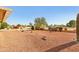 Landscaped backyard with desert plants and gravel at 13917 W Pavillion Dr, Sun City West, AZ 85375