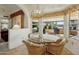 Casual dining area with glass table and wicker chairs at 13917 W Pavillion Dr, Sun City West, AZ 85375