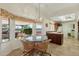 Kitchen with breakfast nook and view of the backyard at 13917 W Pavillion Dr, Sun City West, AZ 85375