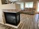 Living room fireplace with a modern design and tile surround at 14960 W Cottonwood St, Surprise, AZ 85374