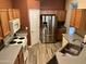 Spacious kitchen with stainless steel appliances and ample wood cabinets at 14960 W Cottonwood St, Surprise, AZ 85374