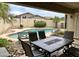 Relaxing pool area with patio furniture and seating at 14960 W Cottonwood St, Surprise, AZ 85374