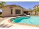 Large inviting pool with brick coping and patio at 14960 W Cottonwood St, Surprise, AZ 85374