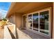 Covered patio with tiled flooring and security door at 16033 N 110Th Ave, Sun City, AZ 85351