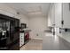 Modern kitchen with black appliances and gray countertops at 16033 N 110Th Ave, Sun City, AZ 85351