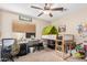 Cozy bedroom featuring carpet, a ceiling fan, and a loft bed with a tent at 17347 W Statler St, Surprise, AZ 85388